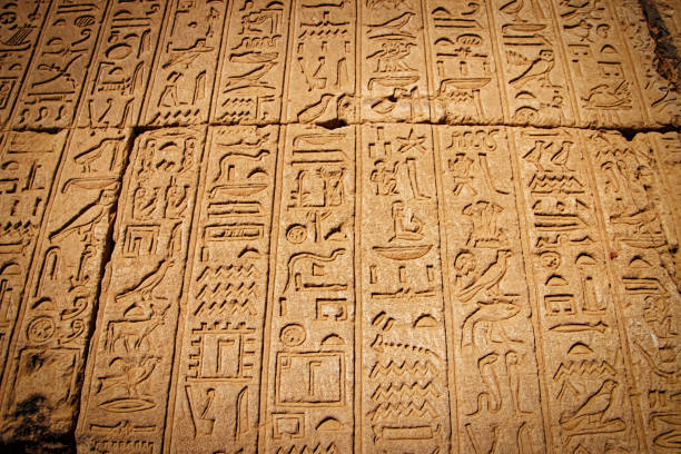 istock Ancient Egyptian writing, Egyptian hieroglyphs, wall inscriptions 1214101380