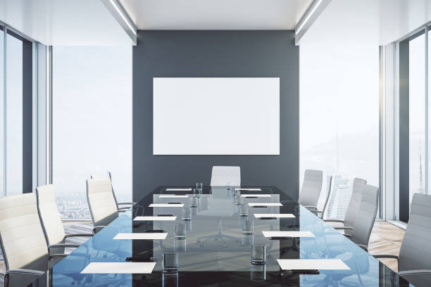 istock Luxury meeting room with blank poster 1214104595