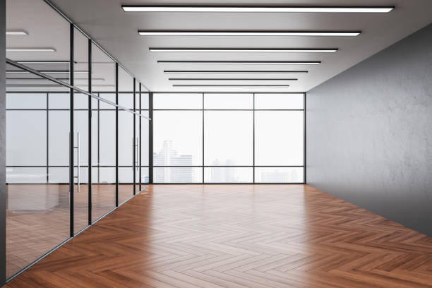 istock Coworking office hall in classic interior with wooden floor. 1214105481