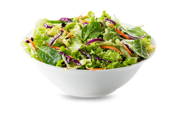 istock Green lettuce salad with fresh vegetables 1214106641