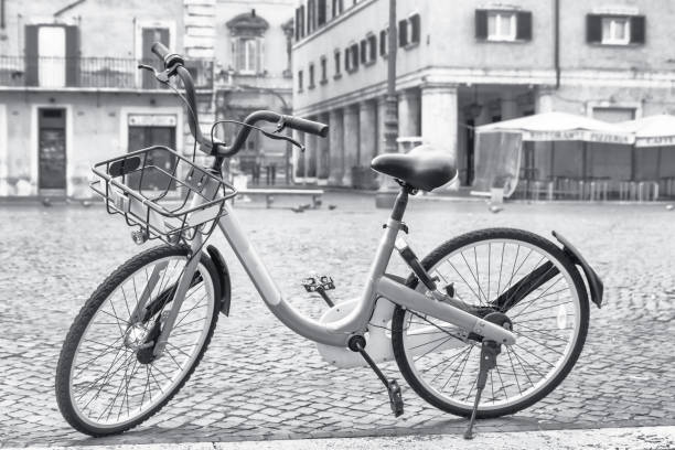 istock Bicycle ready for sharing on the empty Navona Square in Rome. Italy. 1214117874