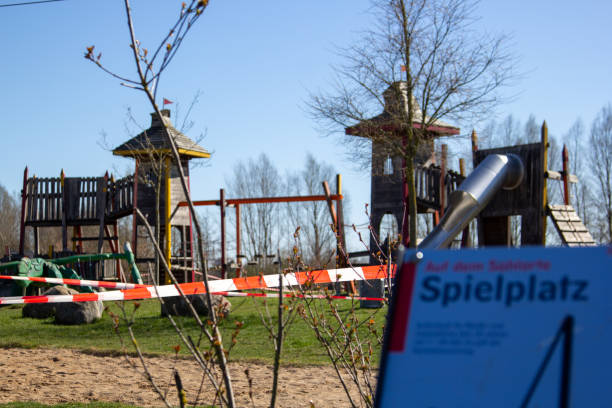istock Playground cordoned off because of the corona virus 1214119310