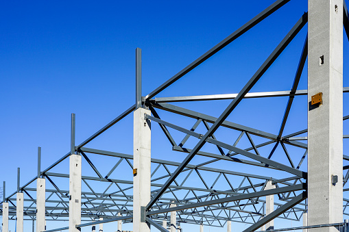 The steel frame of a new factory building under construction
