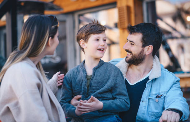 istock Family talking about topics and laughing. 1214121075