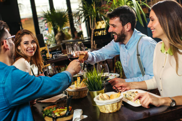 istock Friends enjoying their meal at the restaurant 1214122056