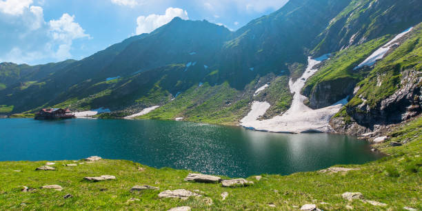 istock beautiful nature of romania mountains 1214122641
