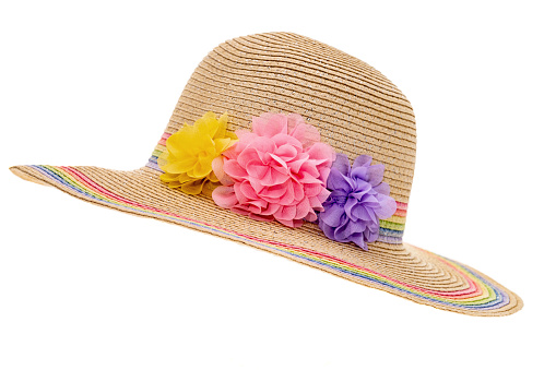 A womens straw beach sun hat - white background