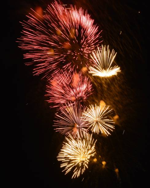 istock Festive fireworks on black background 1214128960