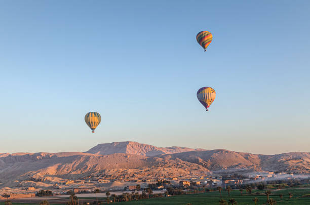 istock Beautiful scenery with balloons in the morning time. 1214129900
