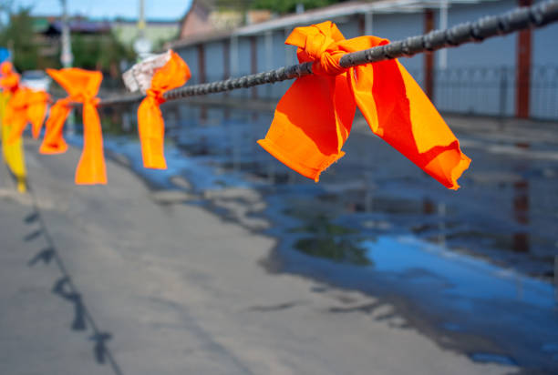 dangerous area marked with orange ribbons