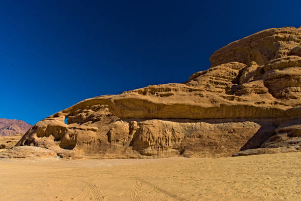 istock A Bridge Shape Rock Formation in the Desert 1214130092