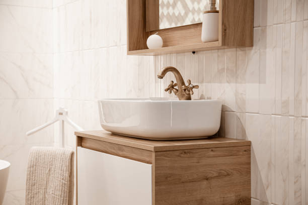 Cozy interior of the bathroom with a beautiful sink.
