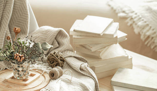 istock Home interior with books and dried flowers. 1214132218