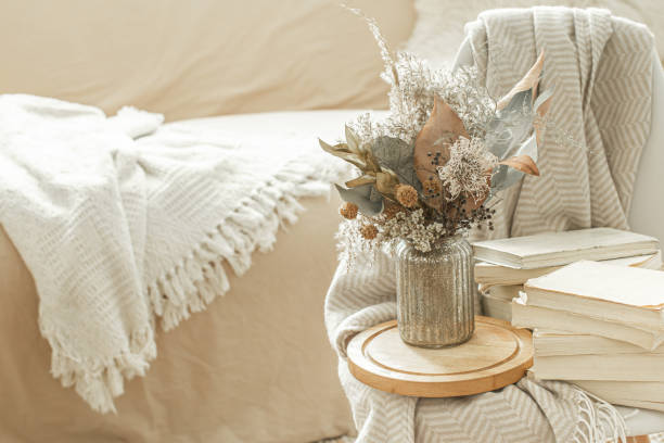 istock Home interior with books and dried flowers. 1214132309