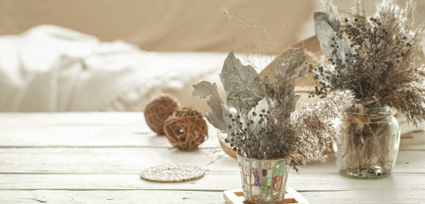 istock Decorative items in the interior with dried flowers. 1214132310