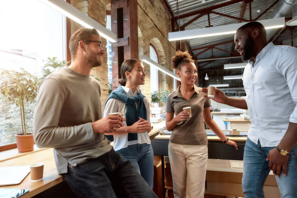 istock Working with you to achieve vision. Creative multi ethnic business group at lunch 1214141352