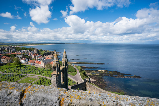 Aerial overview of St. Andrews Cathedral ruins and cemetery along the North Sea coast, St. Andrews, Scotland, Kingdom of Fife,  UK