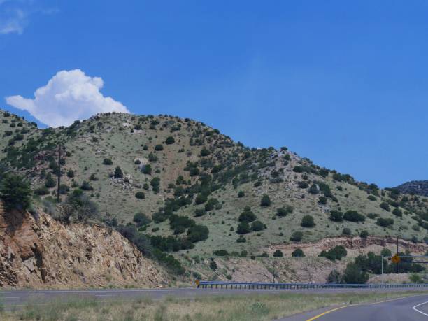 istock Landscape in New Mexico with hills by the highway. 1214147080