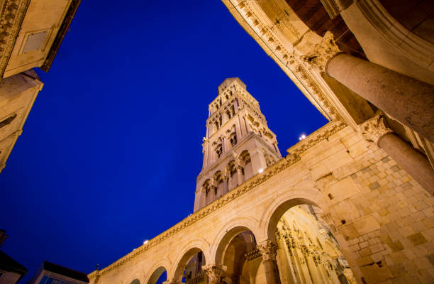 istock Church tower and arch at night 1214148046
