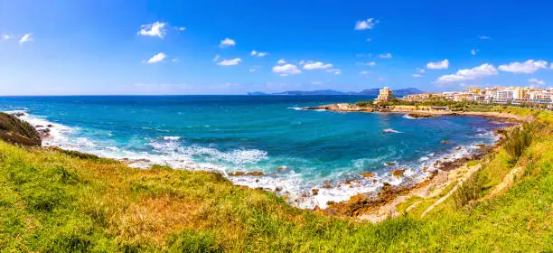 Scenic panoramic view of Mediterranean seacoast in Alghero city, Sardinia island, Italy