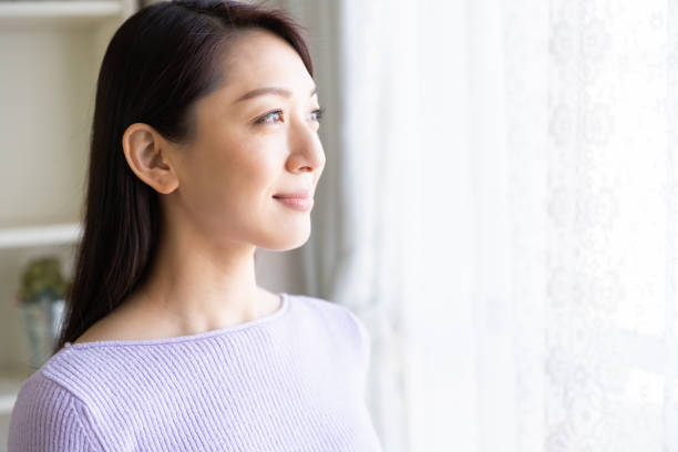 istock asian woman relaxing 1214157834