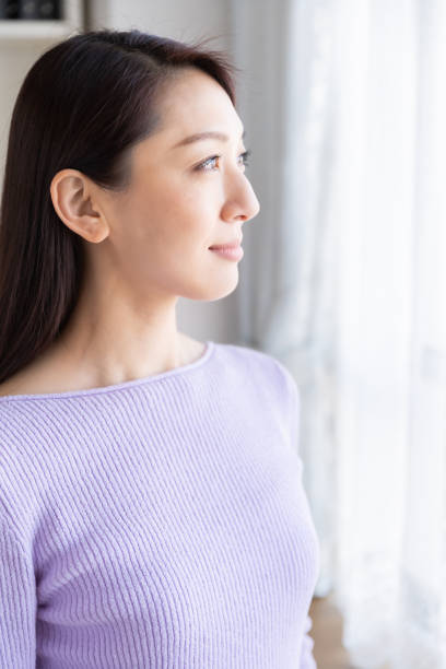 istock asian woman relaxing 1214157848
