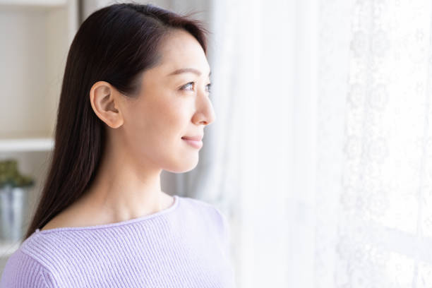 istock asian woman relaxing 1214157858