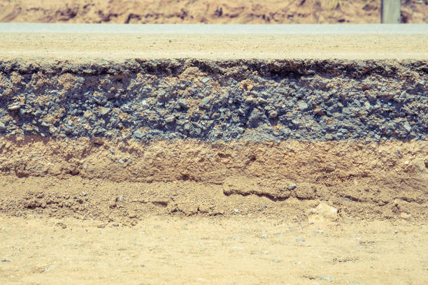 istock asphalt road repair 1214162387
