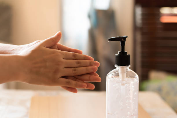 istock Asian people using alcohol,using alcohol gel clean wash hand sanitizer anti virus bacteria. 1214164245