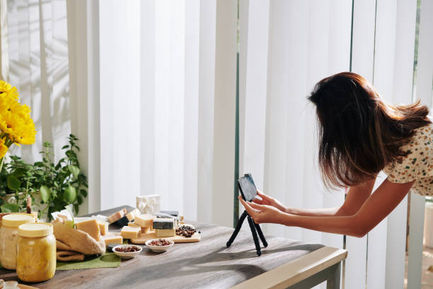 Woman photographing handmade soap