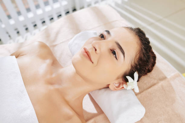 istock Woman relaxing in spa salon 1214165200