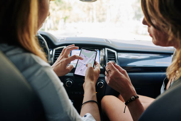 istock Friends discussing map on smartphone screen 1214165826