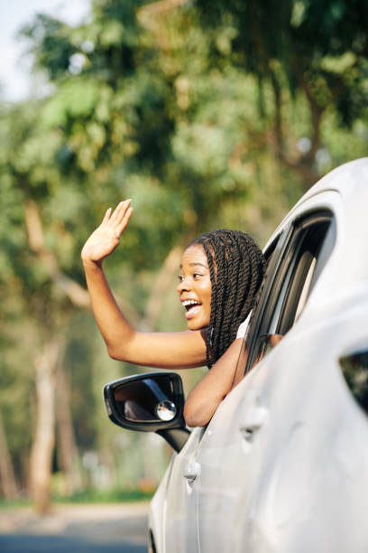 istock Woman waving with hand 1214165983