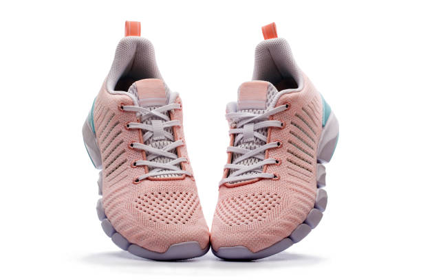 istock Summer pink Women's sneakers on a white background 1214173078