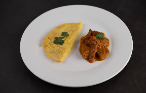 istock Omelette and Massaman placed on a plate on a white background. 1214177901