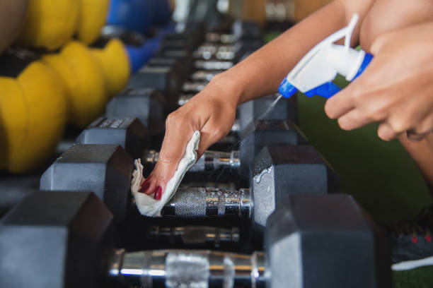 Cleaning dumbbell after used with disinfectant spray