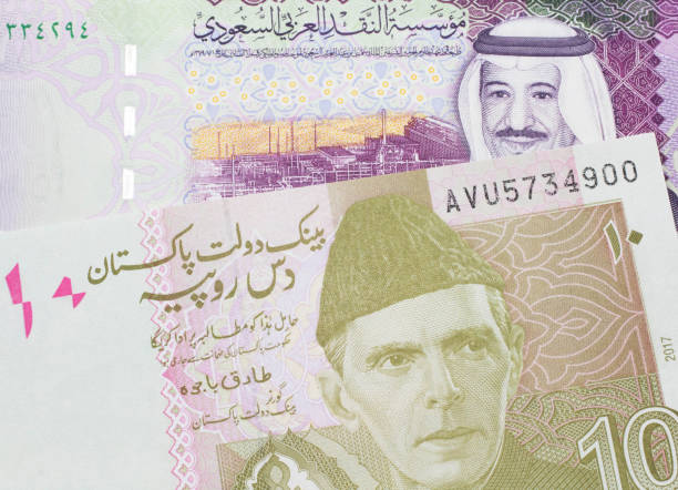 istock A Pakistani rupee note with a five Saudi riyal bank note 1214179345