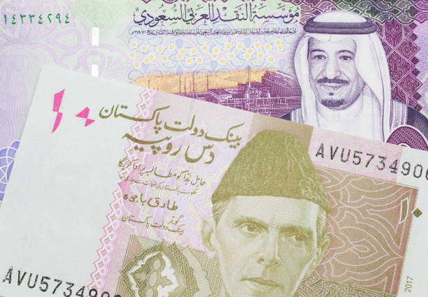 istock A Pakistani rupee note with a five Saudi riyal bank note 1214179467