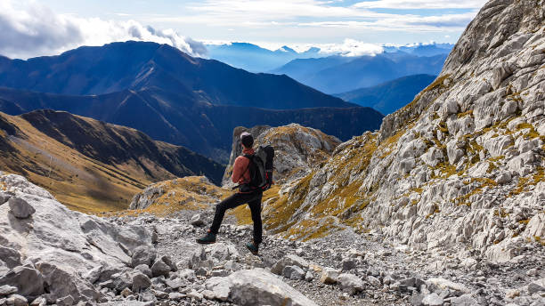 istock High Wait - A man hiking in Alps 1214181458