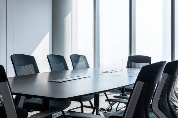 istock Modern office meeting room table and chairs 1214181923