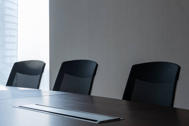 istock Modern office meeting room table and chairs 1214181938