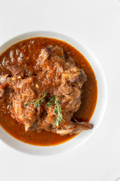 istock Lamb stew with aromatic herbs seen from above 1214187630