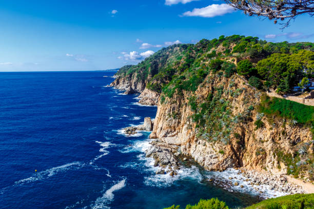 View over the coast of Tossa de Mar, Costa Brava, Spain Landscapes and details of the coast of Tossa de Mar, Costa Brava, Spain tossa de mar stock pictures, royalty-free photos & images