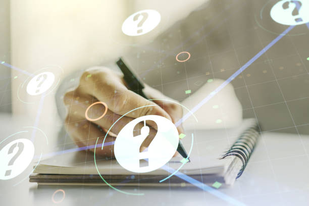 istock Double exposure of question mark hologram and man hand writing in notebook on background. Sociology and psychology concept 1214190035