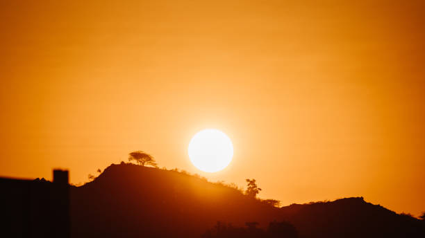 istock Sun besides the mountain during sunset at Mount Abu in Rajasthan, India 1214192035