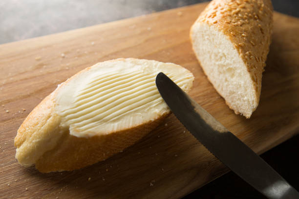 istock French baguette with butter. 1214192221
