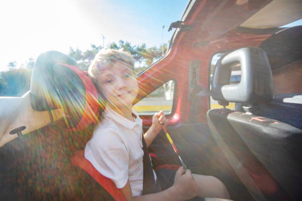istock Road trip. Father and son travelling together by car 1214193895