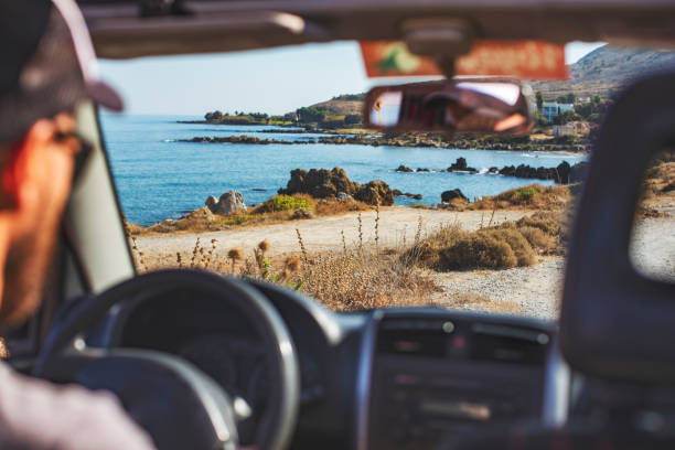 istock Road trip. Father and son travelling together by car 1214193972