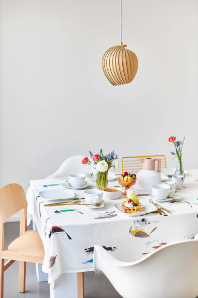 istock Various photos of a spring decorated table with waffles, fruit, fresh flowers and juice 1214195033