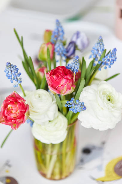 Various photos of a spring decorated table with waffles, fruit, fresh flowers and juice Various photos of a spring decorated table with waffles, fruit, fresh flowers and juice in a stylish apartment hyacinth red stock pictures, royalty-free photos & images